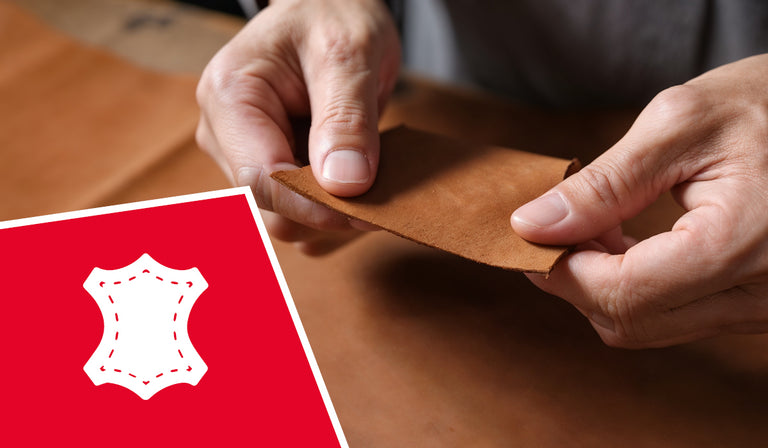 Hands holding a piece of brown leather material. A red icon displays a white leather hide symbol, indicating genuine leather craftsmanship.