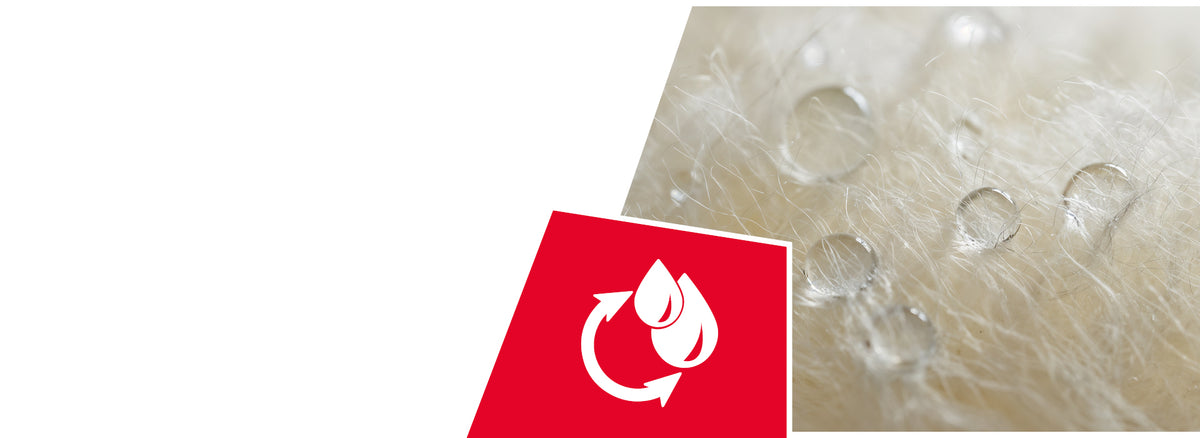 Close-up of fine, curly white wool fibers with natural texture and shine. A red icon shows white water droplets with a circular arrow, indicating moisture-wicking or recyclable properties.