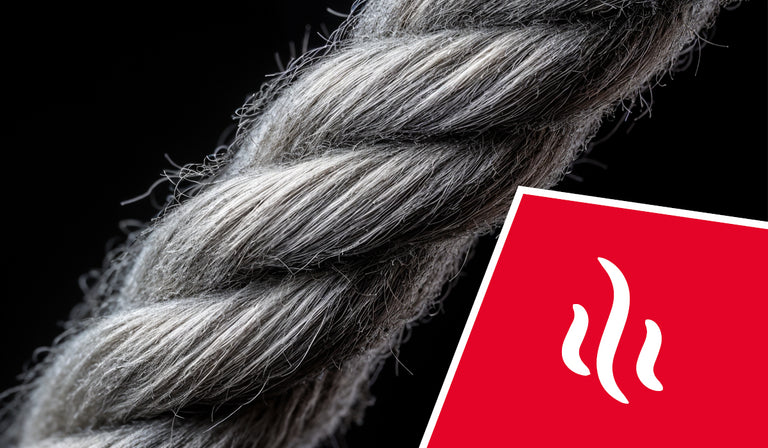 Close-up of twisted gray and white natural fiber strands against a black background. A red icon shows white curved lines indicating odor control or freshness properties.