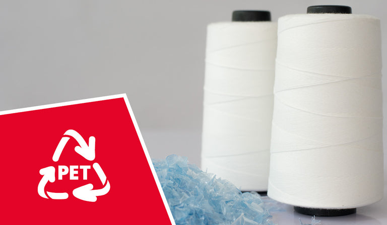 Two large spools of white thread or yarn with blue plastic bottles visible at their base. A red icon displays the PET recycling symbol, indicating recycled plastic materials used in production.